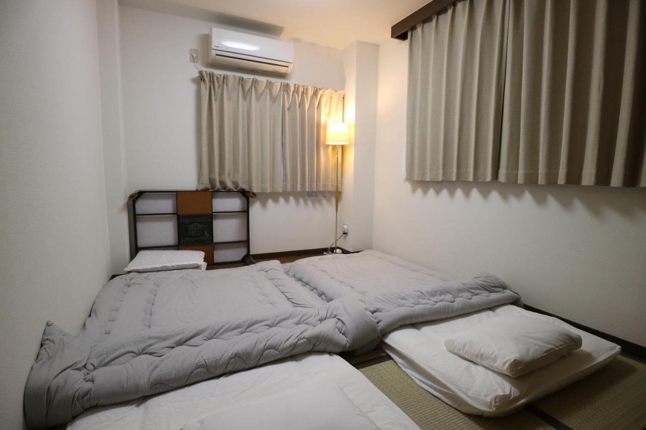 Ferienwohnung Base Ōsaka Exterior foto